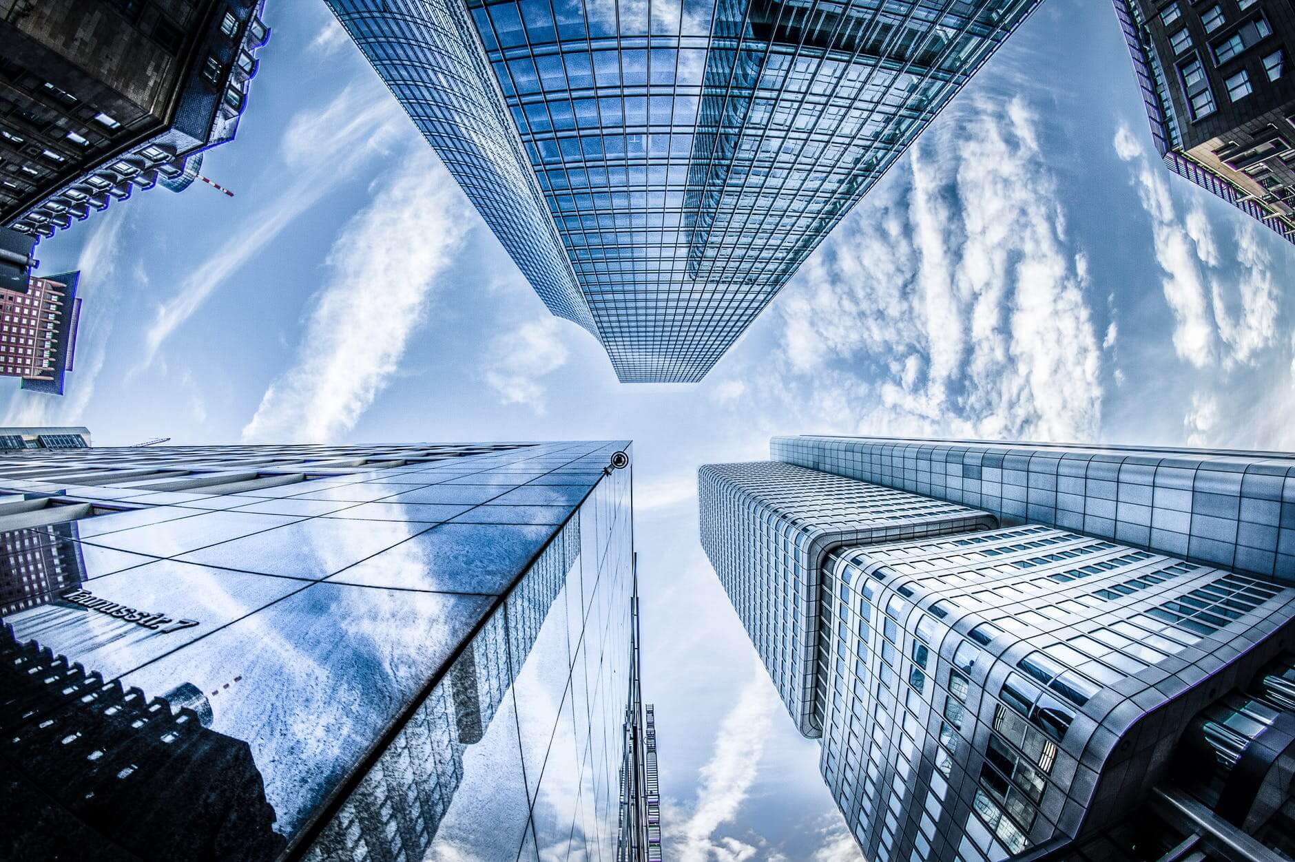 worms-eye-view-corporate-office-building-glass-sky